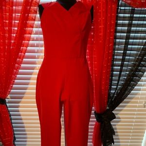 Red all in one red jumper.